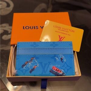 Louis Vuitton bright blue card holder with multicolor accents